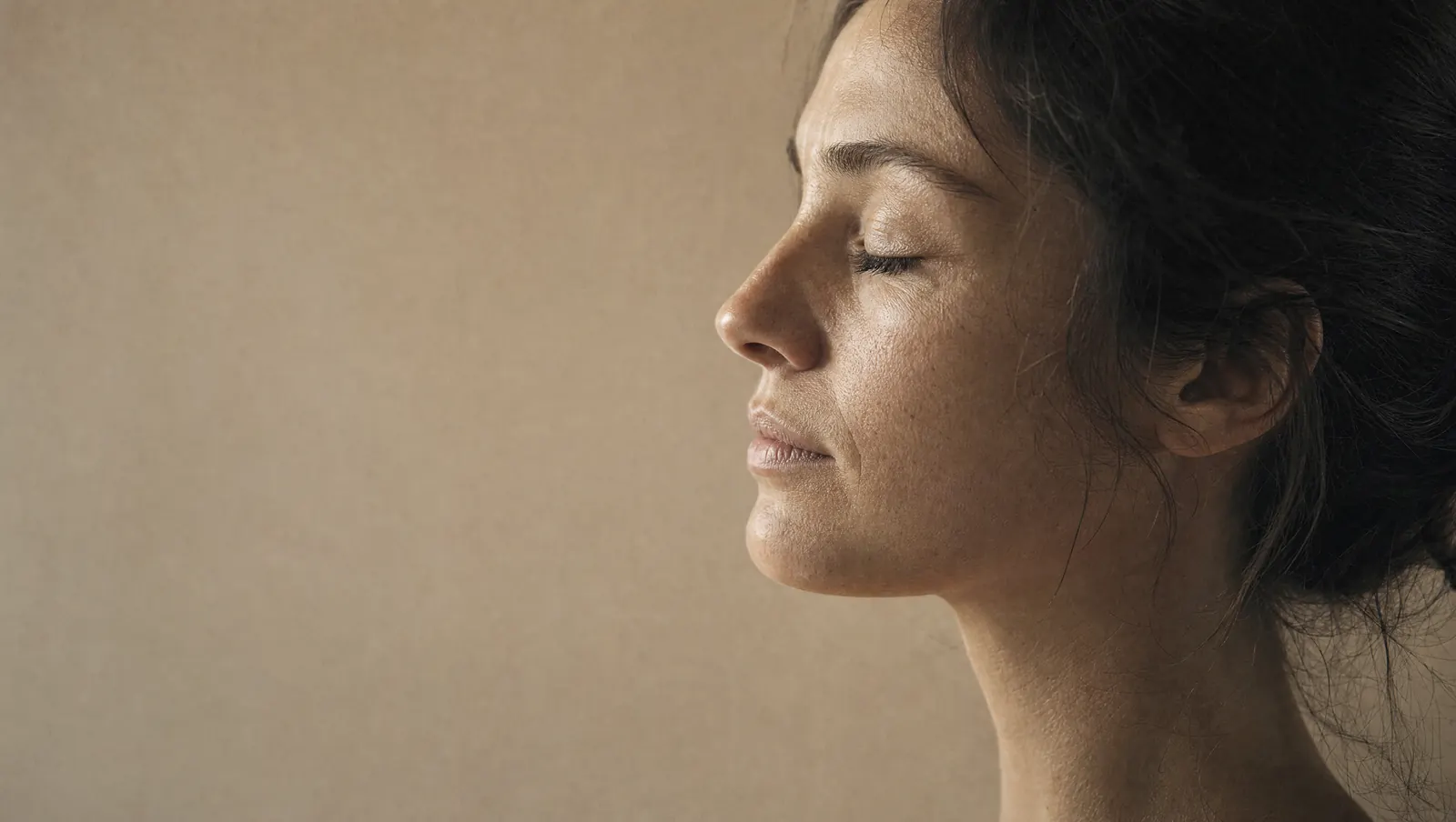 A woman's profile in soft daylight